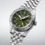 Seiko 5 Sports Field GMT HDB001 39.4mm automatic watch with green dial, 24-hour dual-time display, stainless steel case and stainless steel bracelet.
