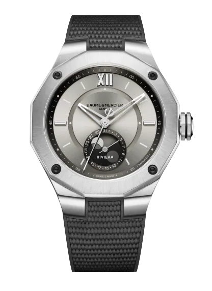 Baume & Mercier Riviera 10681 Baumatic front view — 43 mm steel case, beige sable sun-satin dial with moon-phase at 6 o’clock, grey rubber strap.