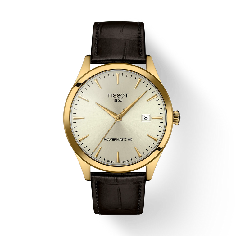 Front View: Tissot Classic Dream 40 mm with ivory dial and full yellow-gold PVD case & bracelet.
