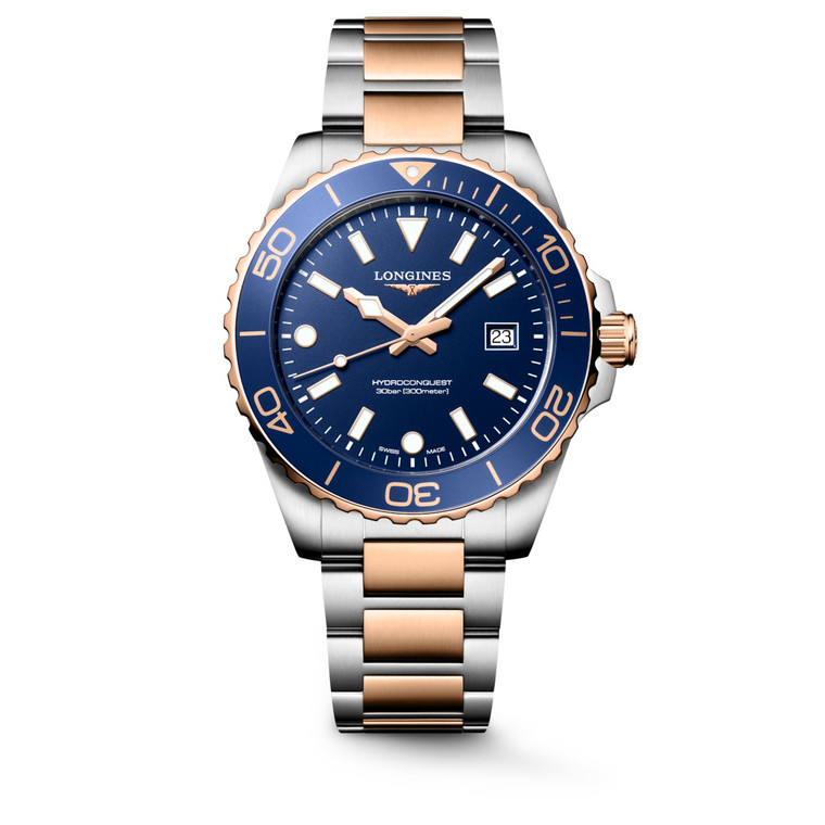 Longines HydroConquest L3.769.3.98.7 42mm Swiss quartz dive watch with blue sandblasted dial, blue unidirectional rotating bezel, and stainless steel with red PVD-coated bracelet.