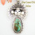 Kachina Royston Turquoise Sun Movable Pendant Navajo Artisan Freddy Charley NAP-1514 On Sale Now at Four Corners USA OnLine Native American Jewelry