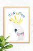 A happy cockatoo illustrated wall art print featuring a happy bird with it yellow crest standing high. A unique illustration set on a few white background.