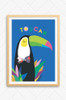 A brightly coloured illustration of a black and white toucan with a colourful beak. The bird sleeps peacefully with coloured leaves poking below him. Set on a bright blue background the word toucan is playfully arranged above the bird.