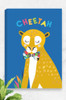 A ready to hang canvas of a cheetah wearing a giant floral bowtie. It's eyes are closed and it has a peaceful demeanour. The bright oranges of the big cats body, contrast with it's shiny golden spots and bright blue background. The word cheetah is playful arranged above it's head in a colourful font.