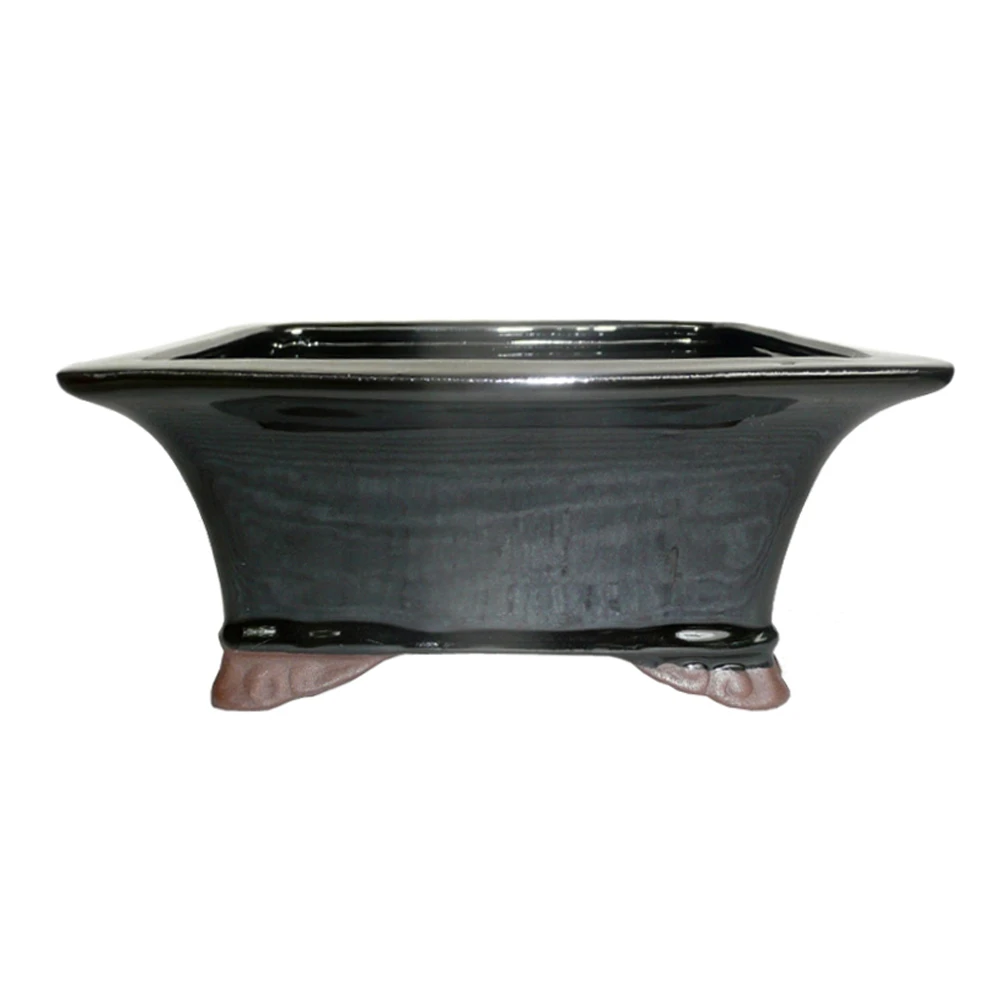 a black rectangular object with legs