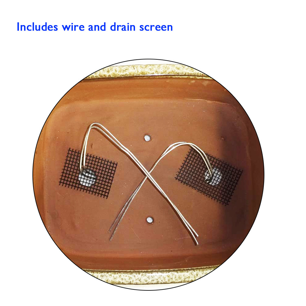 Circular close-up of the underside of a large, brown, ceramic pot with two square, wire mesh pads attached to the bottom by two small screws, each with white wires protruding. The text "Includes wire and drain screen" is visible in the upper left corner.