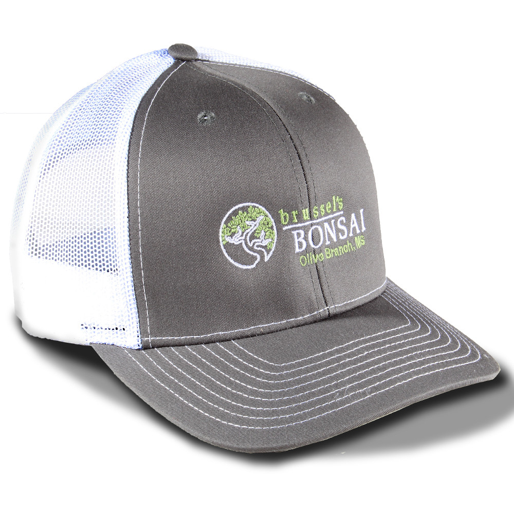 a grey and white hat