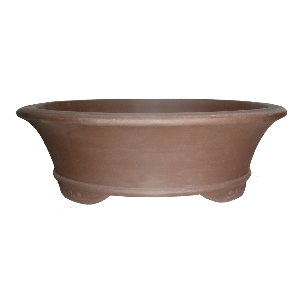 a brown bowl with legs