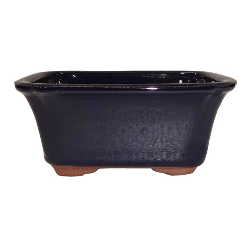 a black rectangular pot with legs