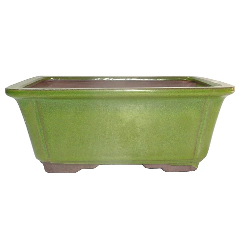 a green rectangular pot with a square bottom