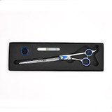 Monk Blue 10" Straight Shear in a protective black foam-lined case with gel finger ring and shear oil