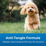 A curly poodle running through a grassy field. Text on image reads: ‘Anti-Tangle Formula’ and 'Releases mats and gently lifts away dirt and grime.'