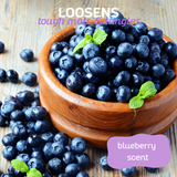 Wooden bowl filled with fresh blueberries, accompanied by the text 'loosens tough mats and tangles, blueberry scent'