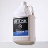Jug of Grooming Artist Deep Cleanse & Volume Shampoo on a clean, minimal background with soft shadow