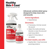 Two bottles of Healthy Skin + Coat antimicrobial spray with product information and directions for wound and skin care.