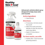 Two bottles of Healthy Skin + Coat antimicrobial spray with product information and directions for wound and skin care.