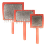 Group shot of the three available sizes of Chris Christensen Big G Slicker Brushes