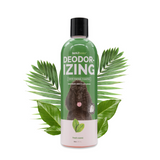 16 oz bottle of Bark2Basics Deodorizing Shampoo, with fresh, green leaves in the background