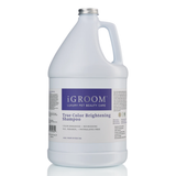 Front view of a gallon jug of iGroom True Color Brightening Shampoo on a white background