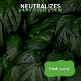 Close-up of lush green leaves with glistening water droplets, accompanied by the text: 'neutralizes odors and cuts grease, fresh scent'