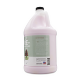 Side view of Bark2Basics Re-Moisture Conditioner gallon jug, showcasing product label with ingredients and description
