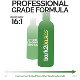 Bark2Basics 16 oz bottle shown larger than a competing brand, highlighting its professional-grade formula with up to 16:1 dilution and higher concentration