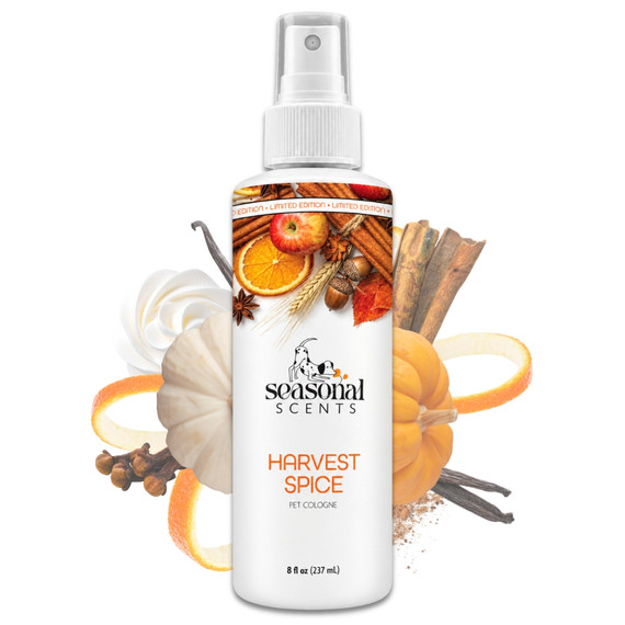 Front view of an 8 oz bottle of Seasonal Scents Harvest Spice Cologne surrounded by pumpkin, orange, cinnamon and other fall fragrance elements.