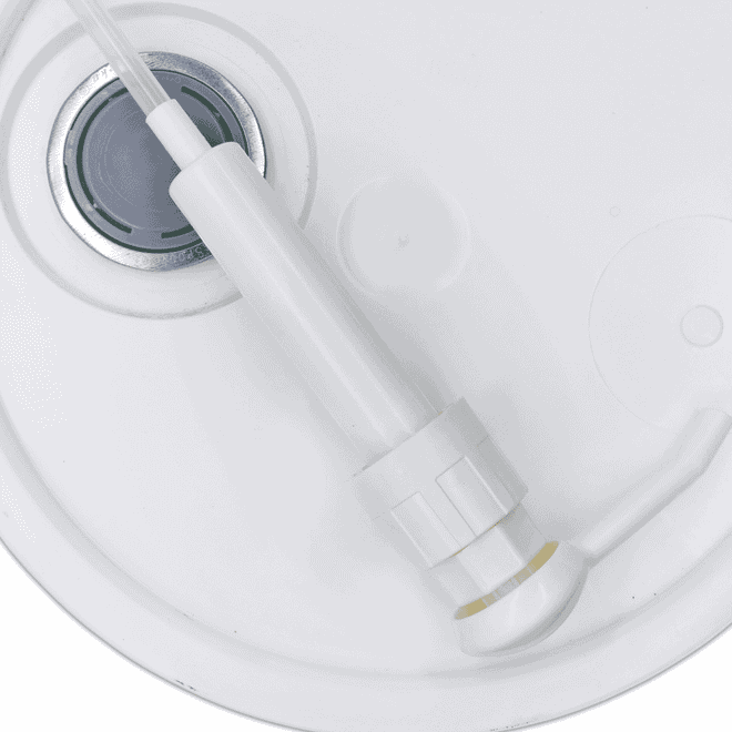 Pump for 5 Gallon Pail Shampoo Containers, close up on top of 5 gallon pail, bird's eye view