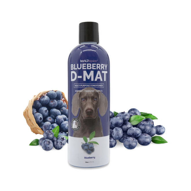 16 oz bottle of Bark2Basics Blueberry D-Mat Conditioner, displayed with fresh blueberries rolling out of a wooden basket
