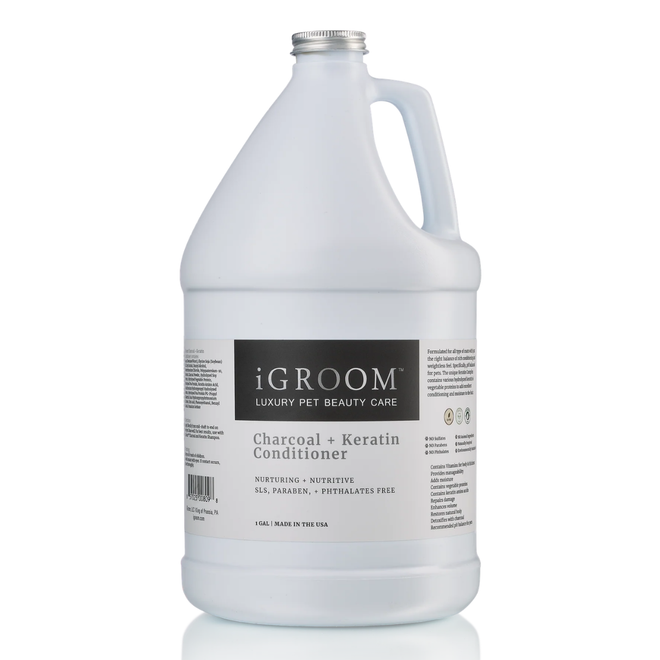 Front view of a gallon jug of iGroom Charcoal + Keratin Conditioner on a white background