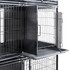 Close-up of DuraDog Economy 6-Cage Bank STD, shown with door opened and divider and pan extended