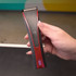 Close-up of user holding Wahl Bravura2 Cordless 5-in-1 Clipper in hand