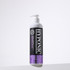 Bottle of Grooming Artist Hand Scissoring & Volume Shampoo on a clean, minimal background with soft shadow