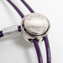 Close-up of the Trach Saver® stainless steel sliding adjuster on a purple grooming restraint, highlighting its secure, throat-pressure-reducing design.