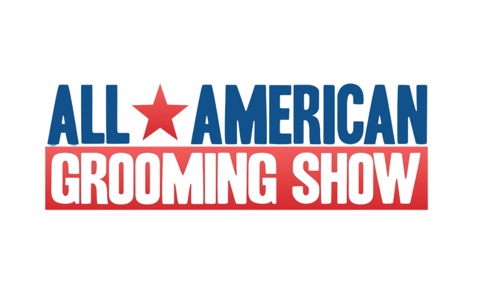 Red, white and blue All American Grooming Show 2026 logo representing the Schaumburg, Illinois trade show attended by Groomer’s Choice