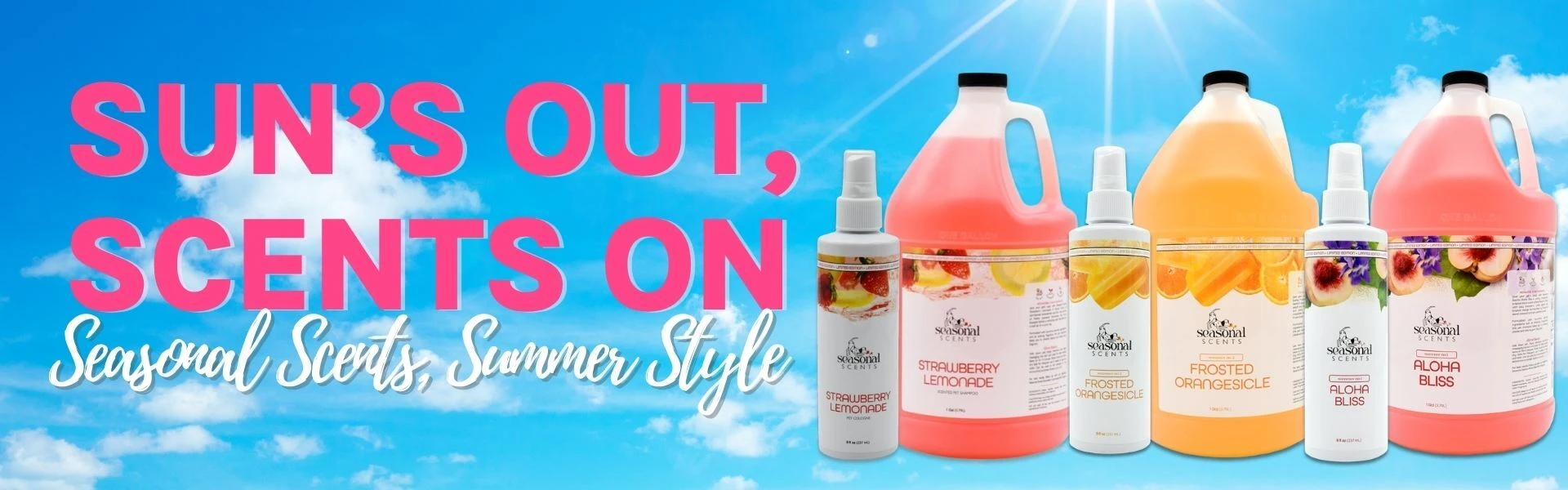 Summer promotional banner with text “Sun’s Out, Scents On – Seasonal Scents, Summer Style,” featuring multiple scented spray bottles and gallon containers including Strawberry Lemonade, Frosted Orangesicle, and Aloha Bliss against a bright blue sky background.