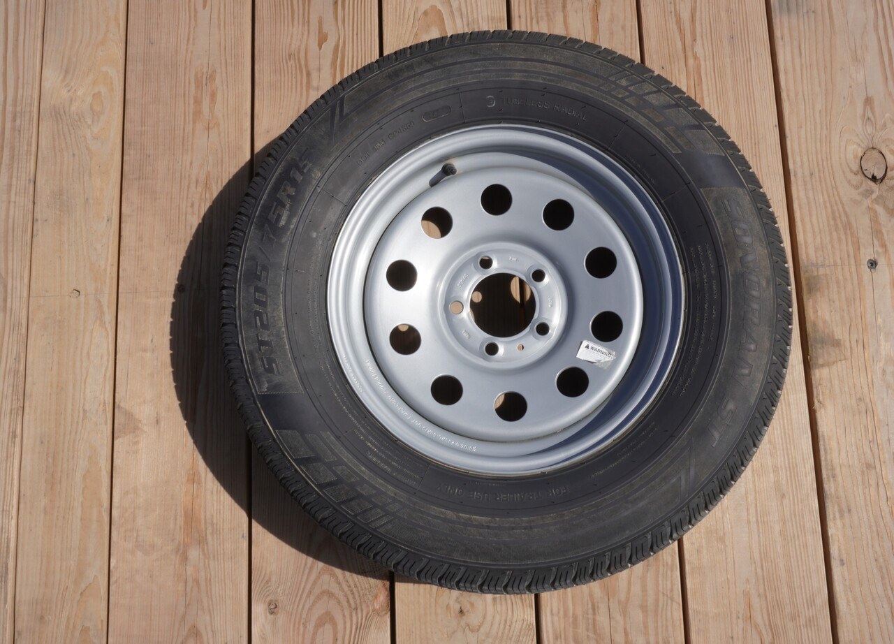 Wheel/Tires 15"X 5" 5 X 5 Silver 205/75 R-15 Radial