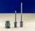 Johnson screw driver lined up with the Johnson Screw Little Johnson, and the Johnson Screw Big Johnson from left to right on a table with a blue background.