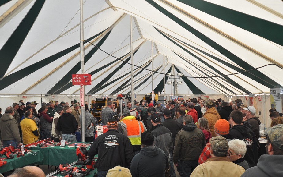 Crowd inside a tent at a product show