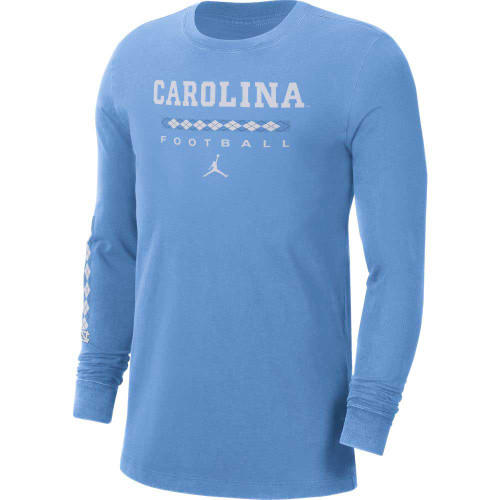 Carolina Blue long sleeve tee with CAROLINA in big bold letters followed by a strip of the Tar Heel argyle - TARGYLE.  The botton line is football and then a Nike Jumpman logo.