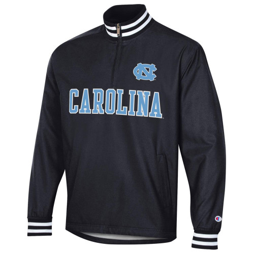 Black 1/4 zip jacket with an NC and Carolina across the chest.  White and black striped cuffs and collar.