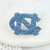 Interlocking NC pin made from Carolina Blue rhinestones.