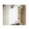 Installed ABB ReliaHome Smart Panel Indoor mounted on a wall, showing active status lights, connected wiring, and side access ports, with the ABB logo visible on the front.