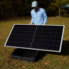 Man holding installing a panel on the Powerfield mount