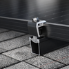 SnapNrack black mid clamp for Ultra Rail solar mounting systems.