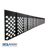 SolaTrim black aluminum pest abatement barrier panels with diamond vent pattern arranged in a row