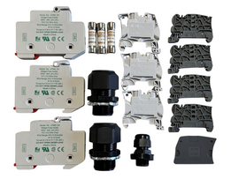 Solar fuse kit including three fuse holders with installed fuses, four spare fuses, multiple gray terminal blocks and end covers, and three black cable glands of varying sizes.