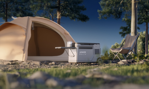 Campsite with tent and chair at night showing Anker EverFrost 2 Cooler setup.