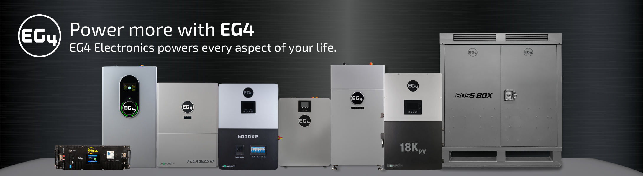 Line up of many different EG4 batteries, inverters, and more on dark metal background.