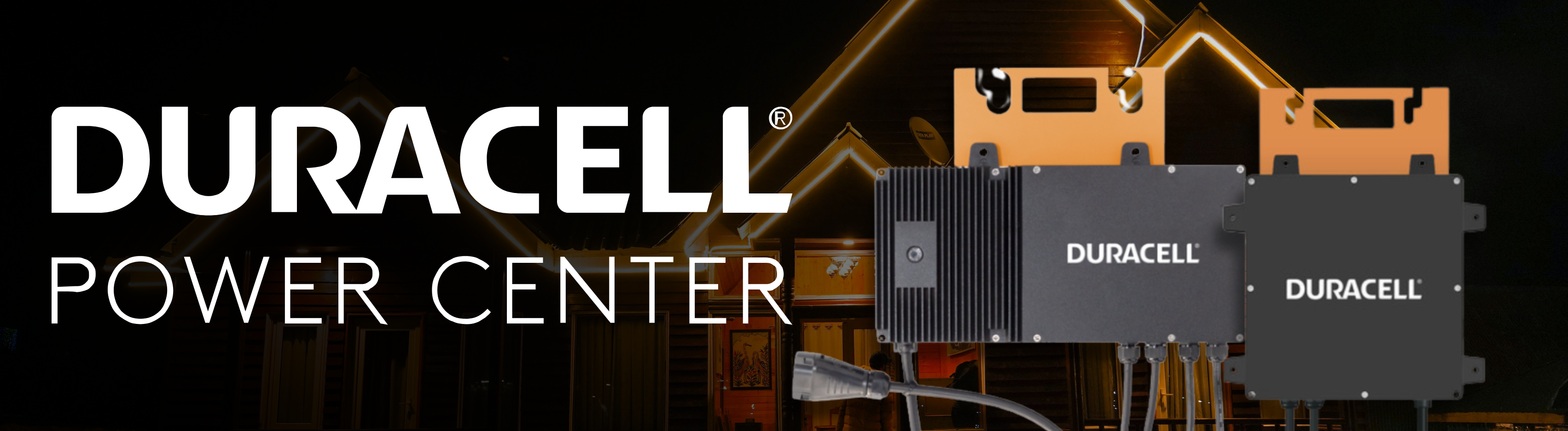 Duracell Power Center showing microinverters in front of house at night with lights on